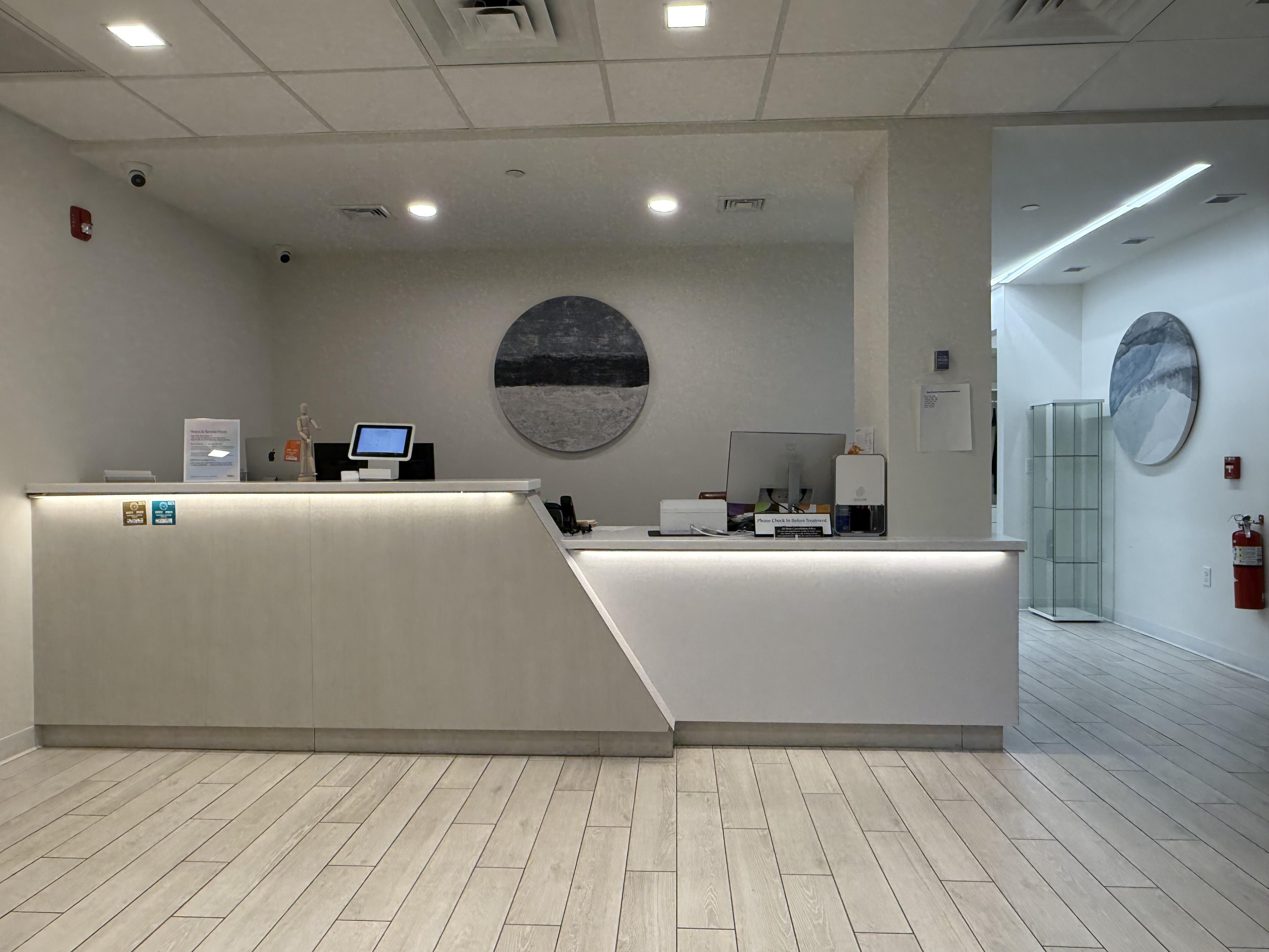 Clean, professional medical spa treatment room with neutral tones at Total Vitality in Hackensack